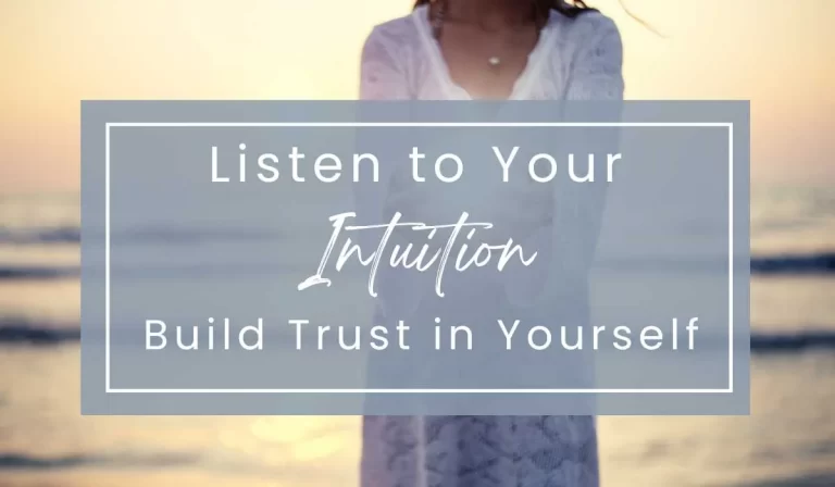 Woman on beach listening to intuition